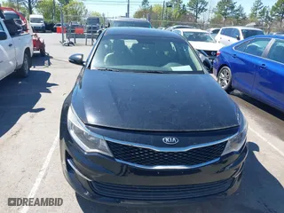 2016 Kia Optima LX with VIN 5XXGT4L3XGG013835, listed as a IAAI auction lot 41815349 with 120,628 mi miles. Bid and sale history available at carsss.com. Image 12.