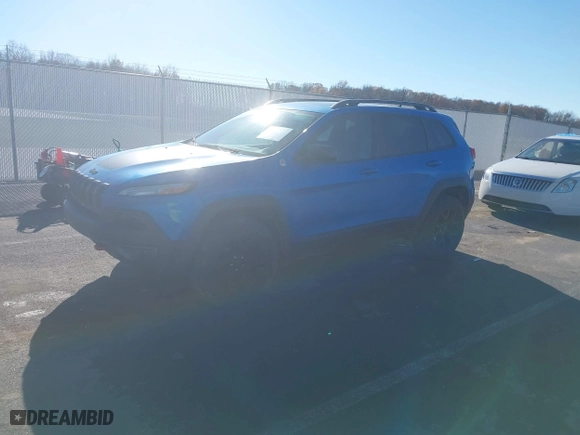2018 Jeep Cherokee Trailhawk with VIN 1C4PJMBB2JD529977, listed as a IAAI auction lot 40888811 with 112,937 mi miles. Bid and sale history available at carsss.com. Image 18.