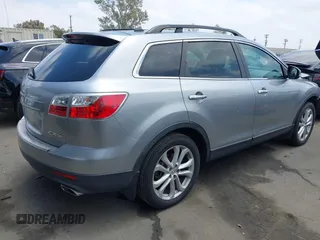 2011 Mazda CX-9 Grand Touring z VIN JM3TB2DA5B0319538, wystawiony jako IAAI lot #42429157 z przebiegiem 88 321 mil mil oraz . Historia ofert i sprzedaży dostępna na DreamBid. Obrazek 4.