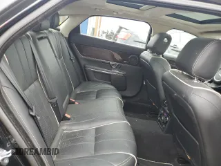 2014 Jaguar XJ Portfolio with VIN SAJWJ2GD4E8V69651, listed as a Copart auction lot 52426195 with 56,413 mi miles and Salvage title. Bid and sale history available at DreamBid. Image 10.