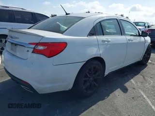 2013 Chrysler 200 Limited with VIN 1C3CCBCG8DN751644, listed as a IAAI auction lot 42117556 with 128,554 mi miles. Bid and sale history available at carsss.com. Image 4.