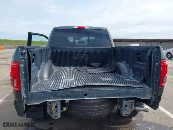 2015 Ford F-150 XLT w/HD Payload Pkg with VIN 1FTFW1EG6FFB62533, listed as a IAAI auction lot 41828378 with 130,033 mi miles. Bid and sale history available at carsss.com. Image 6.