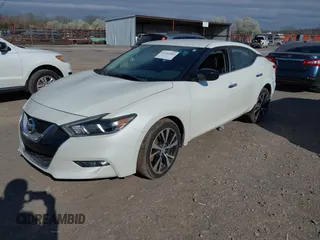 2017 Nissan Maxima Platinum with VIN 1N4AA6AP9HC444350, listed as a IAAI auction lot 41761566 with 90,604 mi miles and . Bid and sale history available at DreamBid. Image 2.