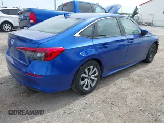 2022 Honda Civic LX z VIN 2HGFE2F27NH563406, wystawiony jako IAAI lot #42103175 z przebiegiem 69 488 mil mil oraz . Historia ofert i sprzedaży dostępna na DreamBid. Obrazek 4.