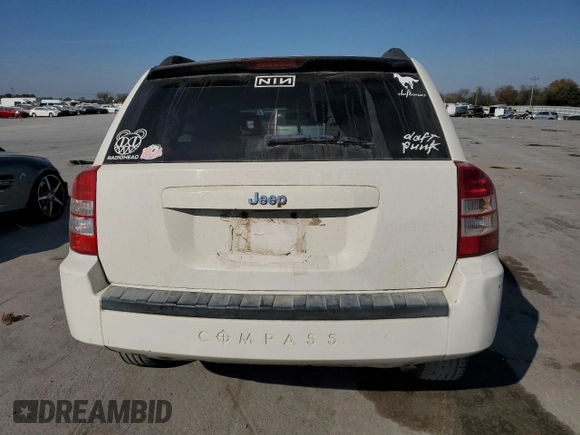 2007 Jeep Compass Sport with VIN 1J8FT47047D418703, listed as a Copart auction lot 77315704 with 159,932 mi miles and Salvage Title. Bid and sale history available at carsss.com. Image 6.