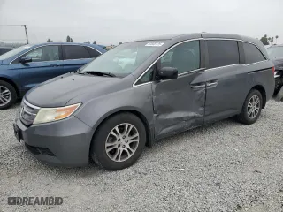 2012 Honda Odyssey EX with VIN 5FNRL5H42CB106894, listed as a Copart auction lot 50588125 with 153,776 mi miles and Salvage Title. Bid and sale history available at carsss.com. Image 1.