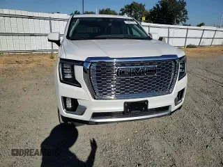 2021 GMC Yukon XL Denali with VIN 1GKS2JKL3MR178037, listed as a Copart auction lot 70825784 with 61,966 mi miles and Salvage Title. Bid and sale history available at carsss.com. Image 12.