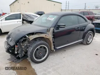 2016 Volkswagen Beetle Wolfsburg Edition с VIN 3VWF17AT7GM631406, выставлен на аукционе Copart как лот 53721815 с пробегом 97 960 миль миль и Списание • Salvage title. История ставок и продаж доступна на DreamBid. Изображение 1.