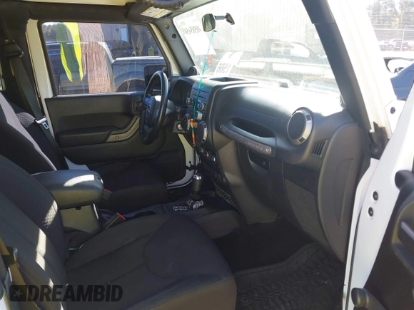 2014 Jeep Wrangler Sport with VIN 1C4AJWAG5EL176998, listed as a IAAI auction lot 40585450 with 114,432 mi miles and . Bid and sale history available at DreamBid. Image 5.