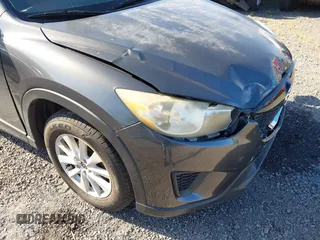2014 Mazda CX-5 Sport with VIN JM3KE2BE8E0313407, listed as a IAAI auction lot 41215428 with 120,387 mi miles and . Bid and sale history available at carsss.com. Image 17.