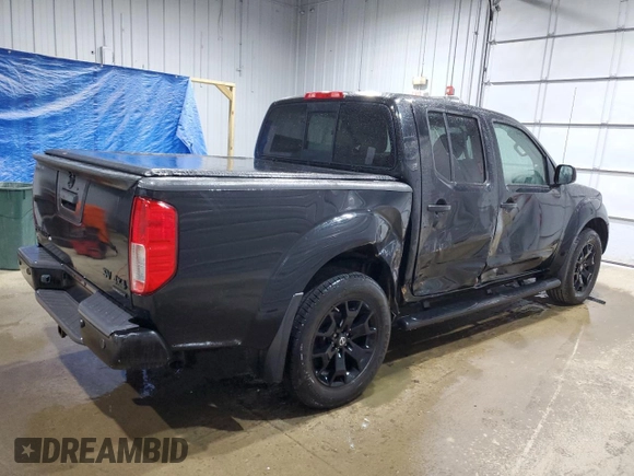 2019 Nissan Frontier SV with VIN 1N6AD0EV1KN733450, listed as a Copart auction lot 54730685 with 59,403 mi miles and Salvage title. Bid and sale history available at DreamBid. Image 3.