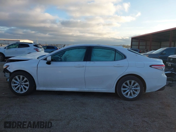 2019 Toyota Camry LE z VIN 4T1B11HK1KU804266, wystawiony jako IAAI lot #41226403 z przebiegiem 91 163 mil mil oraz . Historia ofert i sprzedaży dostępna na DreamBid. Obrazek 15.