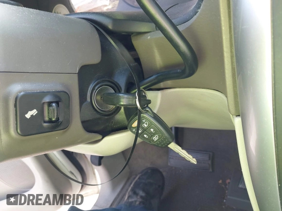 2006 Chrysler Town & Country Touring with VIN 2A8GP54L56R671585, listed as a IAAI auction lot 41475419 with 166,861 mi miles and . Bid and sale history available at DreamBid. Image 11.