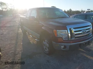 2009 Ford F-150 STX with VIN 1FTRX14869FB33803, listed as a IAAI auction lot 41773290 with 122,945 mi miles. Bid and sale history available at carsss.com. Image 1.