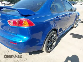 2009 Mitsubishi Lancer with VIN JA3AU86W79U039708, listed as a IAAI auction lot 42065100 with 71,763 mi miles and . Bid and sale history available at DreamBid. Image 4.