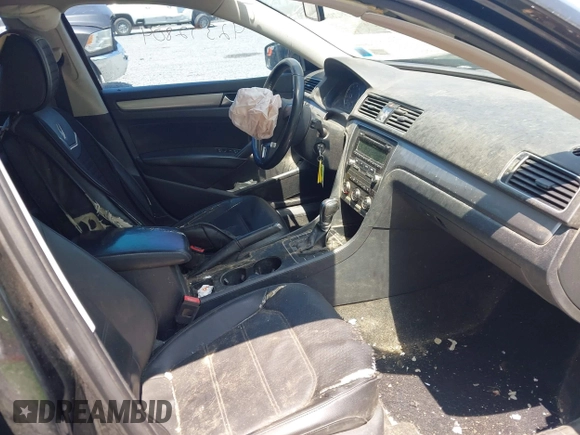2014 Volkswagen Passat S с VIN 1VWAP7A31EC003851, выставлен на аукционе IAAI как лот 42392804 с пробегом 156 302 миль миль и . История ставок и продаж доступна на DreamBid. Изображение 5.