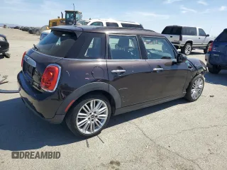 2015 MINI Hardtop 4 Door z VIN WMWXS5C57FT829133, wystawiony jako Copart lot #58764405 z przebiegiem 63 774 mil mil oraz Szkoda całkowita • Salvage title. Historia ofert i sprzedaży dostępna na DreamBid. Obrazek 3.