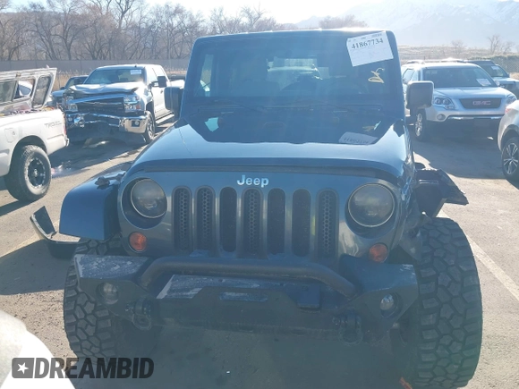 2008 Jeep Wrangler Sahara with VIN 1J4FA54108L543764, listed as a IAAI auction lot 41867734 with 186,145 mi miles and . Bid and sale history available at DreamBid. Image 13.