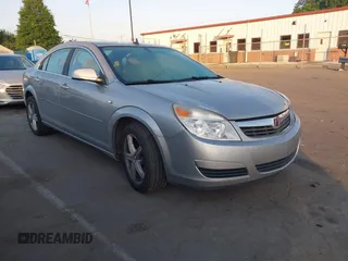 2008 Saturn Aura XE z VIN 1G8ZS57N78F122843, wystawiony jako IAAI lot #42155338 z przebiegiem 142 777 mil mil oraz . Historia ofert i sprzedaży dostępna na DreamBid. Obrazek 1.