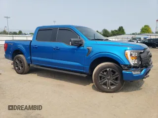 2021 Ford F-150 XL with VIN 1FTEW1EP7MFC02143, listed as a Copart auction lot 59140805 with 27,789 mi miles and Salvage title. Bid and sale history available at DreamBid. Image 4.
