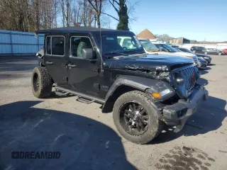 2022 Jeep Wrangler Unlimited Sport with VIN 1C4HJXDG6NW144897, listed as a Copart auction lot 83474284 with Not Provided miles and Salvage Title. Bid and sale history available at DreamBid. Image 4.