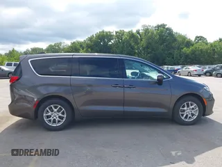 2023 Chrysler Pacifica Touring L with VIN 2C4RC1BG6PR612749, listed as a IAAI auction lot 42612932 with 69,931 mi miles and . Bid and sale history available at DreamBid. Image 13.