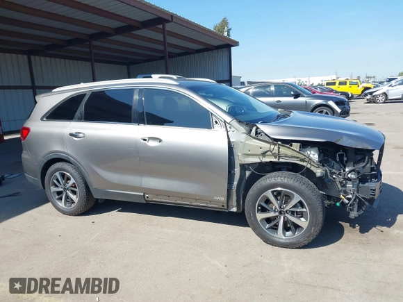 2019 Kia Sorento EX with VIN 5XYPHDA50KG514825, listed as a IAAI auction lot 41612310 with 100,855 mi miles and . Bid and sale history available at DreamBid. Image 14.