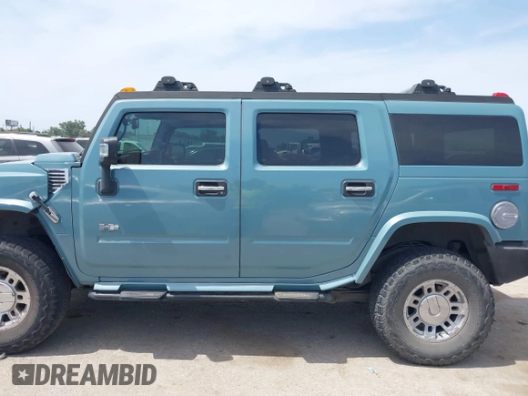 2007 Hummer H2 SUV z VIN 5GRGN23U17H102931, wystawiony jako IAAI lot #42262922 z przebiegiem 299 804 mil mil oraz . Historia ofert i sprzedaży dostępna na DreamBid. Obrazek 14.