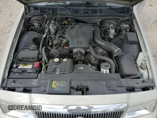 2004 Mercury Grand Marquis GS z VIN 2MEFM74W94X601693, wystawiony jako Copart lot #56303935 z przebiegiem 98 674 mil mil oraz Czysty tytuł • Clean title. Historia ofert i sprzedaży dostępna na DreamBid. Obrazek 11.