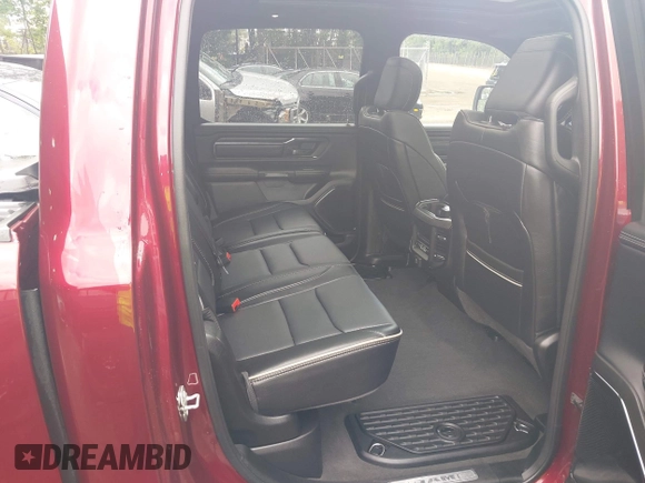 2023 Ram 1500 Limited with VIN 1C6SRFHM2PN509939, listed as a IAAI auction lot 42514018 with 31,669 mi miles and . Bid and sale history available at DreamBid. Image 8.