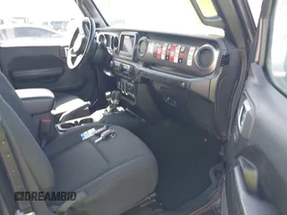 2020 Jeep Wrangler Unlimited Sport Altitude with VIN 1C4HJXDG7LW215344, listed as a IAAI auction lot 41924460 with 51,802 mi miles and . Bid and sale history available at DreamBid. Image 5.