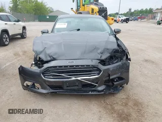 2016 Ford Fusion Titanium with VIN 3FA6P0D97GR133823, listed as a IAAI auction lot 42429708 with 166,105 mi miles and . Bid and sale history available at DreamBid. Image 12.
