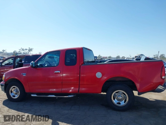 2002 Ford F-150 XL with VIN 1FTRX17W52NA81828, listed as a IAAI auction lot 41450811 with 201,948 mi miles. Bid and sale history available at carsss.com. Image 14.