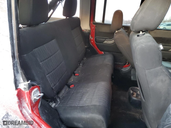 2012 Jeep Wrangler Unlimited Sport with VIN 1C4HJWDG7CL114297, listed as a Copart auction lot 42144525 with 165,482 mi miles and Salvage Title. Bid and sale history available at carsss.com. Image 11.