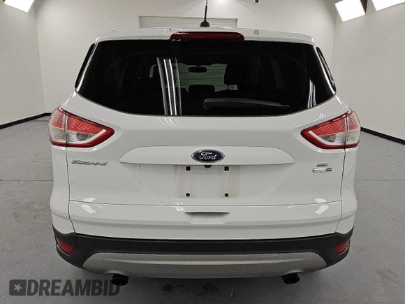 2015 Ford Escape SE with VIN 1FMCU9G90FUB09601, listed as a Copart auction lot 54174665 with 84,560 mi miles and Clean Title. Bid and sale history available at DreamBid. Image 6.