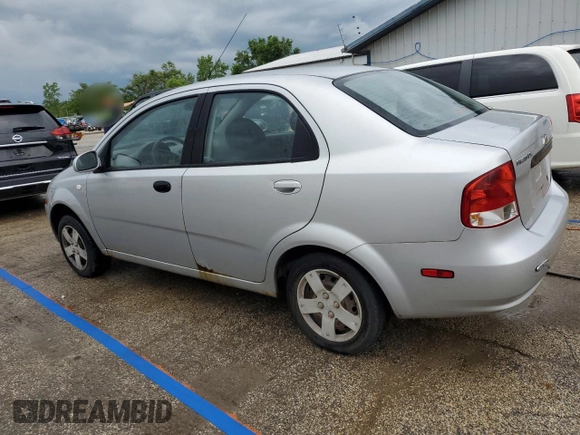 2006 Chevrolet Aveo LS with VIN KL1TD566X6B554368, listed as a Copart auction lot 61682645 with 97,701 mi miles and Salvage title. Bid and sale history available at DreamBid. Image 2.