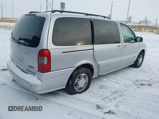 2002 Chevrolet Venture Warner Bros 1SE Pkg with VIN 1GNDX13E82D311155, listed as a IAAI auction lot 41622674 with 196,101 mi miles. Bid and sale history available at carsss.com. Image 4.