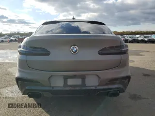 2021 BMW X4 M40i z VIN 5UX2V5C08M9F52562, wystawiony jako Copart lot #83665674 z przebiegiem Nie podano mil oraz Szkoda całkowita • Salvage title. Historia ofert i sprzedaży dostępna na DreamBid. Obrazek 6.