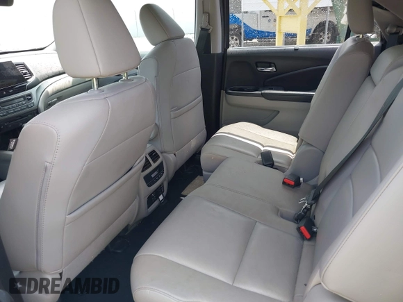 2019 Honda Pilot EX-L with VIN 5FNYF5H4XKB018306, listed as a IAAI auction lot 42441441 with 53,212 mi miles and . Bid and sale history available at DreamBid. Image 8.