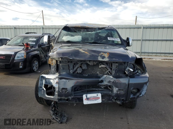 2013 Nissan Titan Pro-4X with VIN 1N6BA0EC2DN305708, listed as a Copart auction lot 45329275 with 68,636 mi miles and Salvage title. Bid and sale history available at DreamBid. Image 5.