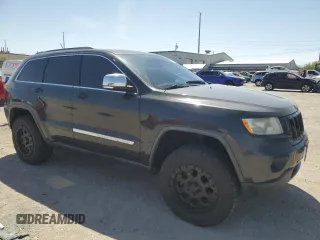 2011 Jeep Grand Cherokee Limited z VIN 1J4RR5GG0BC612109, wystawiony jako Copart lot #53918985 z przebiegiem 194 173 mil mil oraz Szkoda całkowita • Salvage title. Historia ofert i sprzedaży dostępna na DreamBid. Obrazek 4.