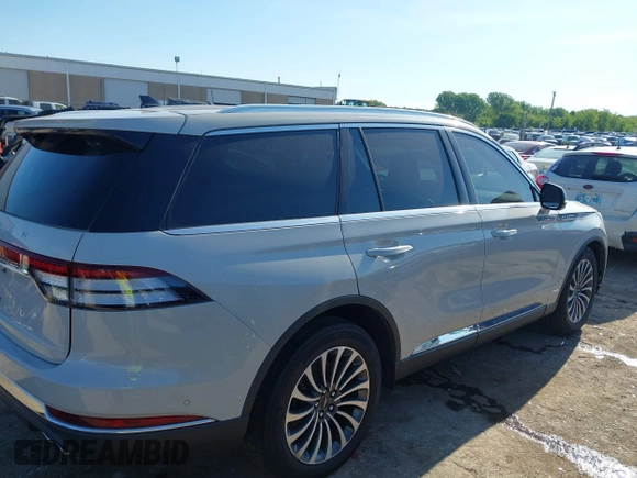 2021 Lincoln Aviator Reserve z VIN 5LM5J7WC6MGL12195, wystawiony jako IAAI lot #42159567 z przebiegiem 95 199 mil mil oraz . Historia ofert i sprzedaży dostępna na DreamBid. Obrazek 13.