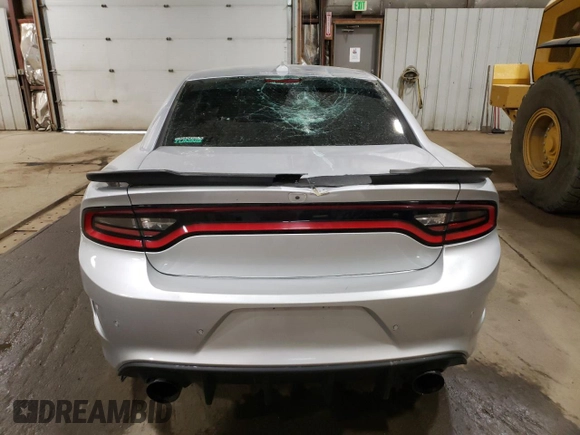 2021 Dodge Charger R/T with VIN 2C3CDXCT5MH522015, listed as a Copart auction lot 61149265 with 77,323 mi miles and Salvage title. Bid and sale history available at DreamBid. Image 6.