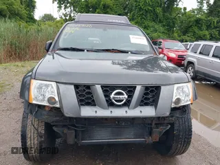 2006 Nissan Xterra S with VIN 5N1AN08W66C502268, listed as a IAAI auction lot 42469020 with 194,559 mi miles and . Bid and sale history available at DreamBid. Image 6.