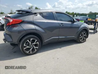 2022 Toyota C-HR XLE z VIN NMTKHMBX2NR140945, wystawiony jako Copart lot #58809375 z przebiegiem 56 161 mil mil oraz Nie do naprawy • Non repairable. Historia ofert i sprzedaży dostępna na DreamBid. Obrazek 3.