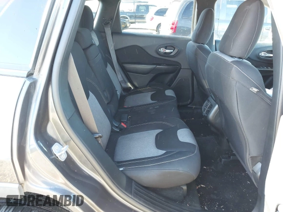 2014 Jeep Cherokee Latitude with VIN 1C4PJMCB5EW294631, listed as a IAAI auction lot 41453628 with 127,847 mi miles and . Bid and sale history available at DreamBid. Image 8.