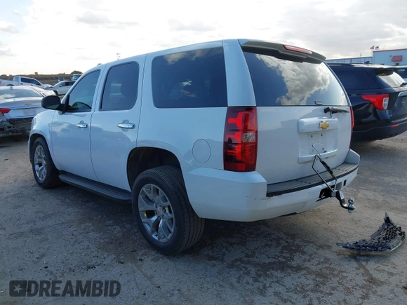 2013 Chevrolet Tahoe Commercial with VIN 1GNLC2E06DR348757, listed as a IAAI auction lot 41711877 with 163,473 mi miles and . Bid and sale history available at DreamBid. Image 3.
