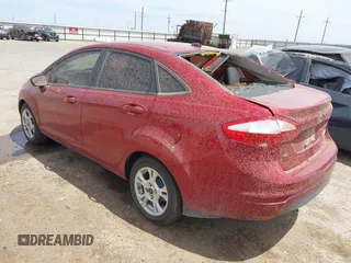 2016 Ford Fiesta SE z VIN 3FADP4BJXGM156814, wystawiony jako IAAI lot #42129721 z przebiegiem 90 353 mil mil oraz . Historia ofert i sprzedaży dostępna na DreamBid. Obrazek 3.
