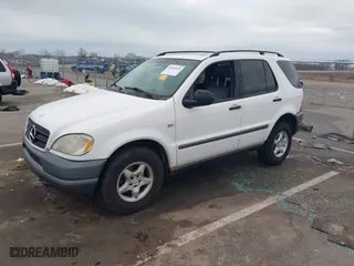 1999 Mercedes-Benz M-Class with VIN 4JGAB54E6XA110195, listed as a IAAI auction lot 41640418 with NaN miles. Bid and sale history available at carsss.com. Image 18.