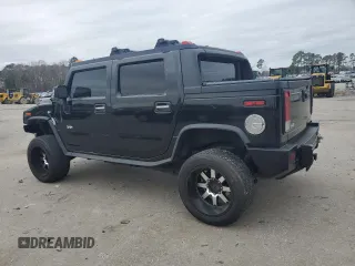 2005 Hummer H2 SUT z VIN 5GRGN22UX5H120312, wystawiony jako Copart lot #43948955 z przebiegiem Nie podano mil oraz Szkoda całkowita • Salvage title. Historia ofert i sprzedaży dostępna na DreamBid. Obrazek 2.